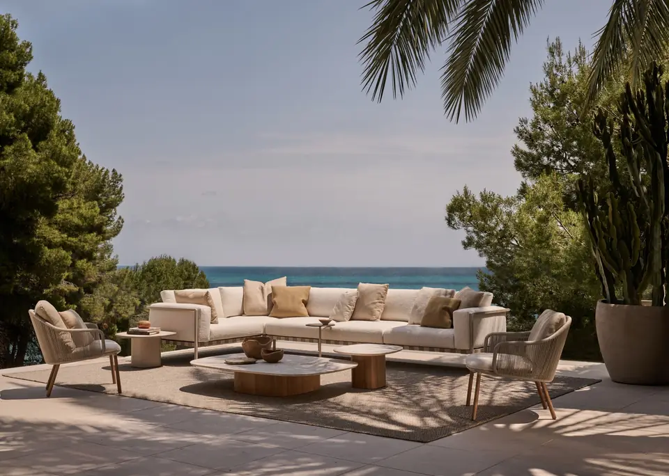 Tribù Natal Alu sofa and meridienne in powder-coated aluminum on a sunlit terrace