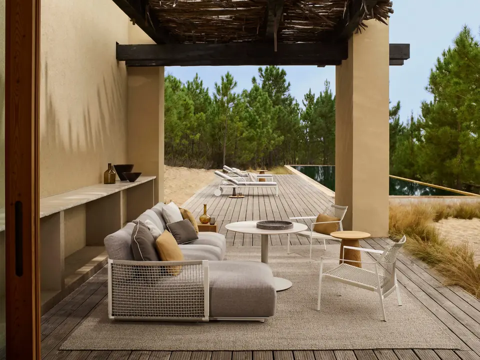 Tribù Nodi modular sofa and armchair with twisted Canax rope on an outdoor terrace